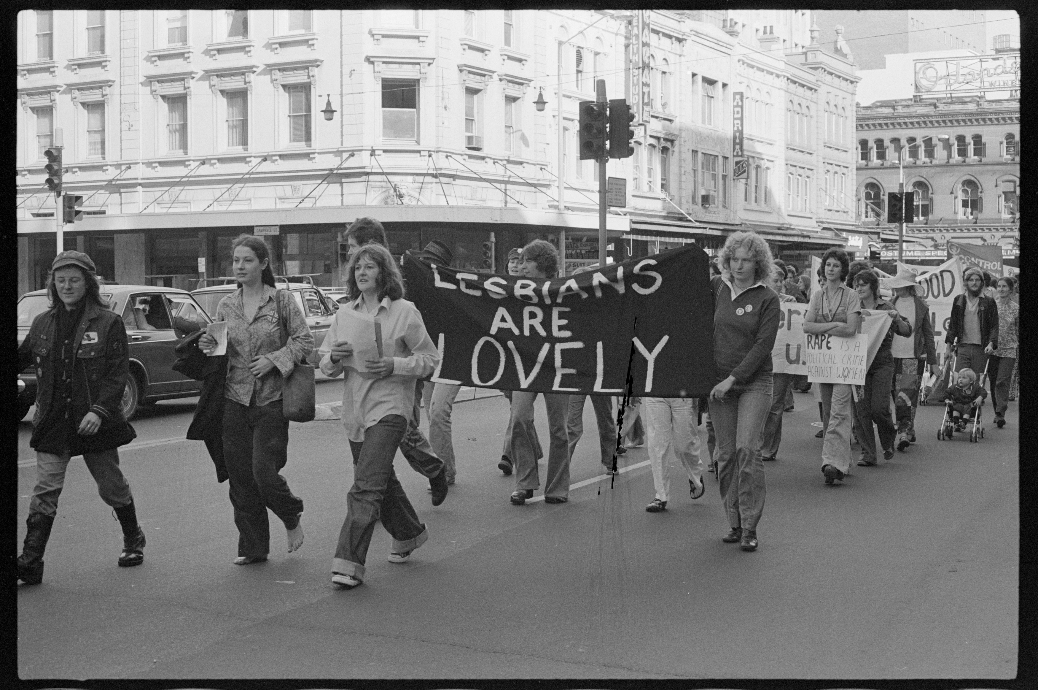 Gay rights supporters carrying 'Lesbians are Lovely' banner, May Day march, Park St at Hyde Park, Sydney. Tribune Collection